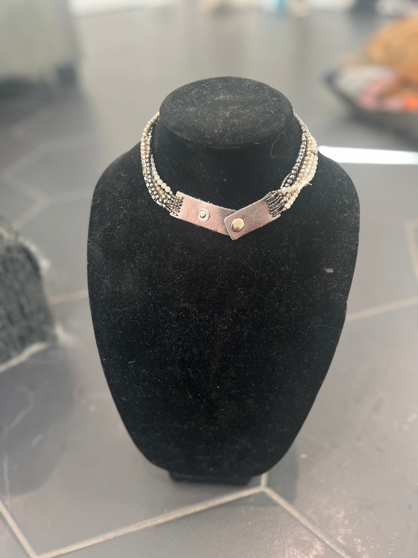 Six strands choker necklace with crystals and chain. $90