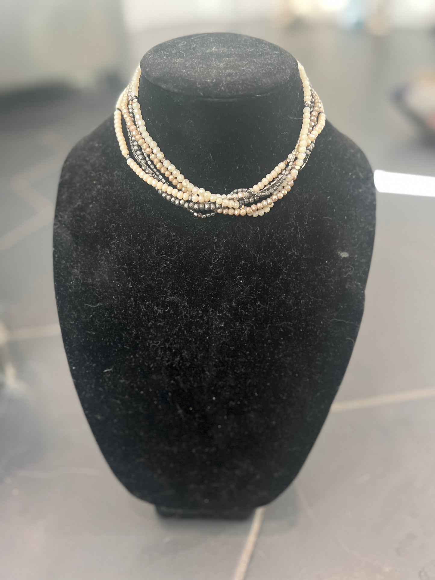 Six strands choker necklace with crystals and chain. $90